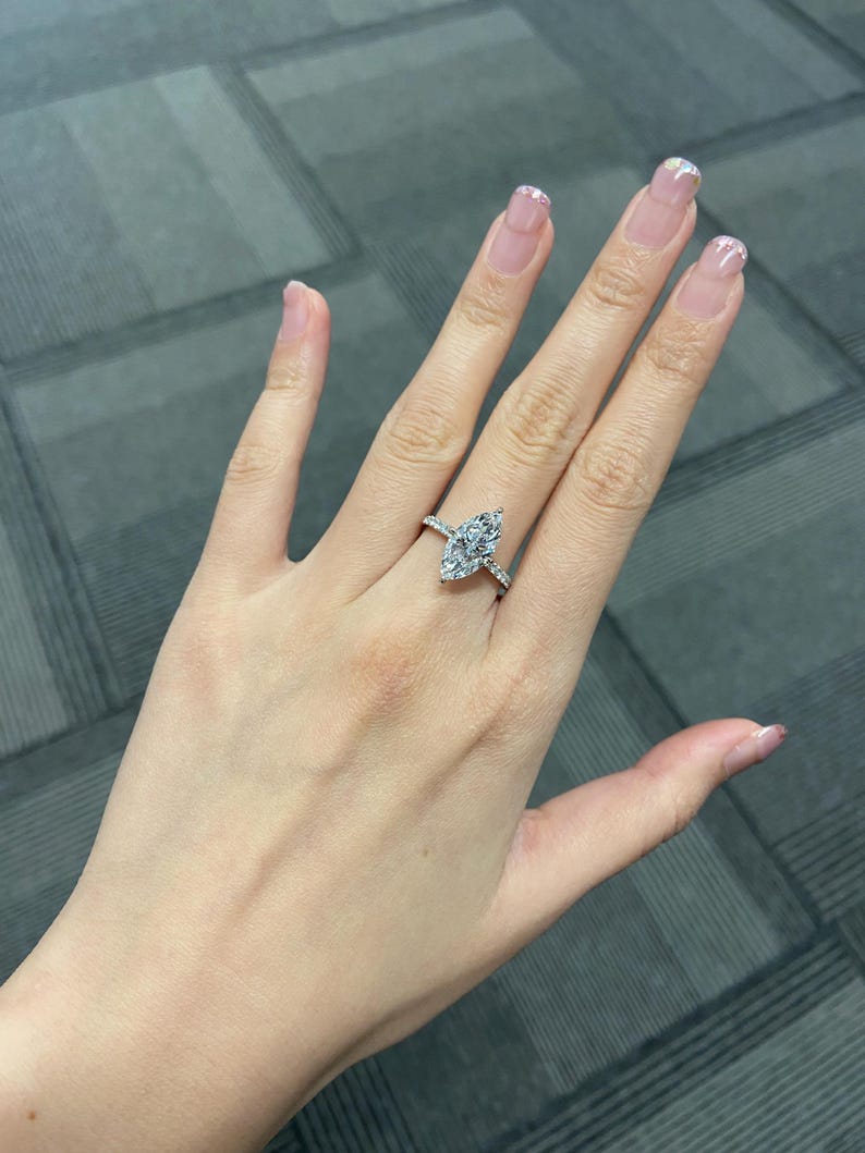 Marquise Shaped Three Stone Lab Grown Diamond Engagement Ring